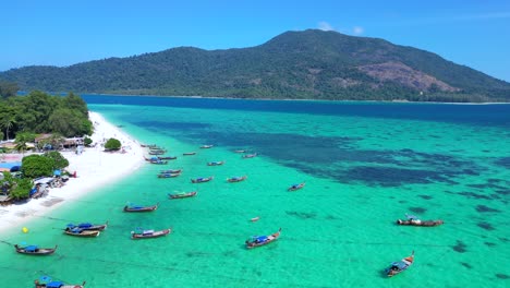 dream-beach-longtail-boats-in-turquoise-water