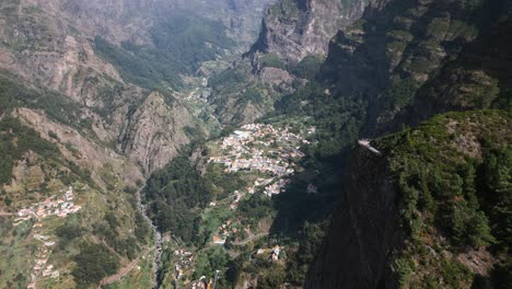 small-village-in-a-green-valley-in-madeira,-green-forest,-green-mountain-landscape,-portugal,-drone,-aerial