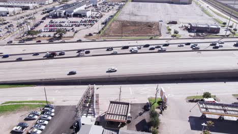 Houston-TX-USA,-Drone-Shot-of-Traffic-on-I-610-Interstate-Highway-in-South-Neighborhoods