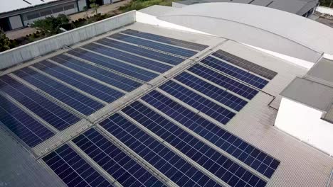 4k-Aerial-of-Warehouse-Solar-Rooftop,-Drone