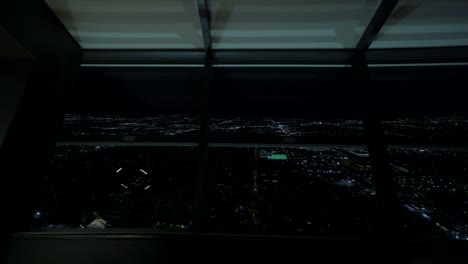 Panning-view-of-Las-Vegas-city-lights-at-night-from-the-top-of-the-Stratosphere-Tower