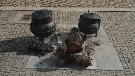Traditional-Cooking-Pots-on-Open-Fire-in-Podence,-Portugal