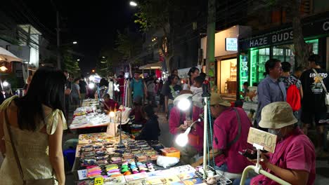 Tourists-and-locals-browsing-products-at-famous-Sunday-Market-in-Chiang-Mai