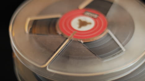 BASF-Professional-Studio-Reel-to-Reel-Audio-Recording-Tape,-Spinning-Close-Up