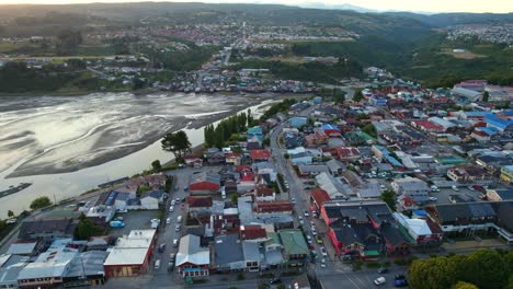 Panoramic-Drone-Aerial-Cityscape-Castro-Chiloé-palafitos-Patagonian-Village-Road-hills-and-environmental-travel-south-american-Destination,-chile
