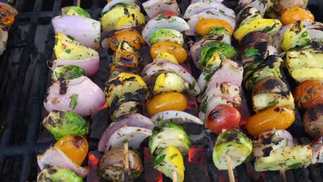 Grilling-veggie-kabobs-on-a-charcoal-grill,-close-up-view