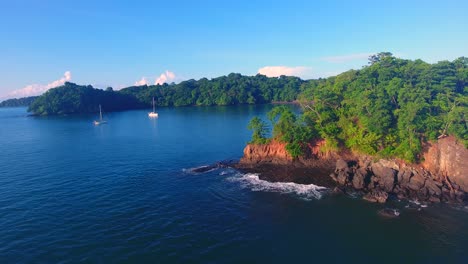 Tripod-Aerial-view-of-two-sailboats-anchored-in-a-little-cove-in-a-beautiful-paradise-of-archipelago-in-Central-America-near-Panama