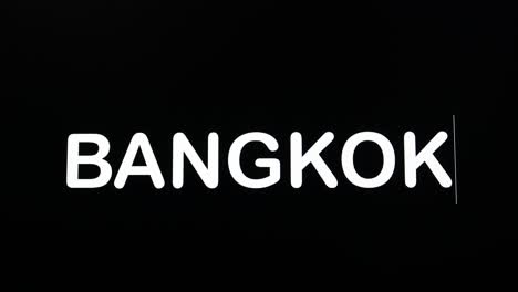 Primer-Plano-De-Bangkok-Escrito-En-La-Pantalla-Del-Monitor-De-La-Computadora-Con-El-Cursor-Parpadeante-En-El-Espacio-De-Copia-De-Fondo-Negro