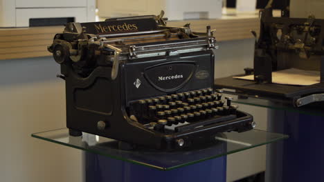 Classical-typewriters-on-display,-first-analog-computers,-non-electrical