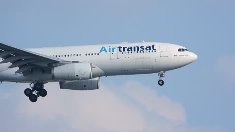 Air-Transat-A330-Commercial-Plane-Mid-Flight-With-Clouds-in-Background