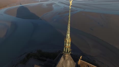 Drone-flying-over-Abbey-of-Mont-Saint-Michel-in-Normandy,-France