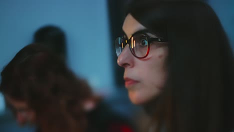 Close-up-of-profile-of-two-ladies-with-glasses-blurred-lens-whack