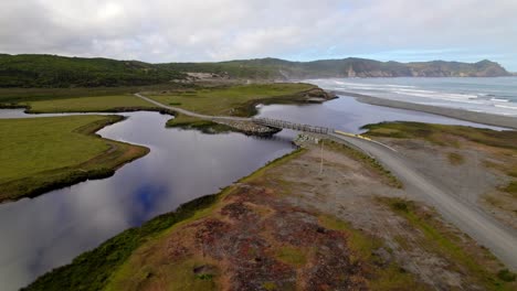 Aerial-top-down-drone-above-water-islets-landscape-of-chiloé-Cucao-patagonian-souls-dock,-Muelle-de-las-Almas,-travel-destination-in-south-america