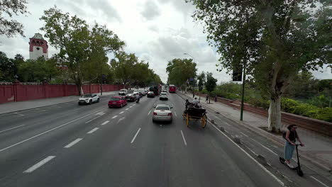 Driving-POV-streets-of-Seville-Spain-cloudy-day-light-traffic-European-city