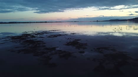 Aerial-view-of-Lagoon-in-Sant'Antioco,-Sardinian-island,-dolly-in,-dusk