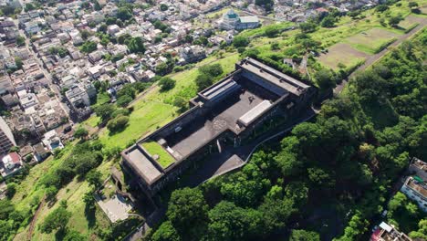 The-historic-citadel-fort-adelaide-overlooking-port-louis-in-mauritius,-greenery-surrounding,-aerial-view