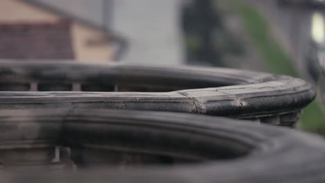 Slow-Motion,-Raindrops-Falling-on-Terraces-in-Residential-Neighborhood-Rainy-Day-in-The-City-Detail