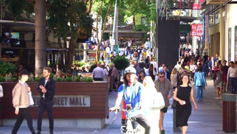 Bustling-downtown-Brisbane-city,-people-shopping-and-dinning-at-Queen-street-mall,-outdoor-pedestrian-shopping-mall,-editorial-concept-shot-for-cost-of-living,-inflation-and-interest-rate-hike