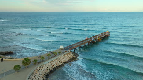 Aerial-View-of-Protaras-Pier-in-Cyprus-at-Peaceful-Sunrise