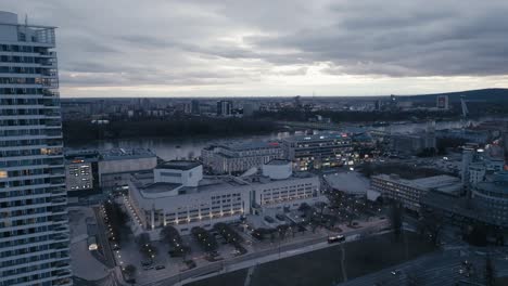 Slovak-National-Theatre-and-Eurovea-shopping-center-at-dusk---aerial-drone-view