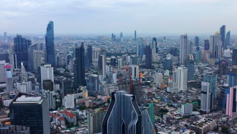 Panning-Aerial-view-of-Bangkok-Silom-Sathon-Central-Business-District-in-daytime---Thailand