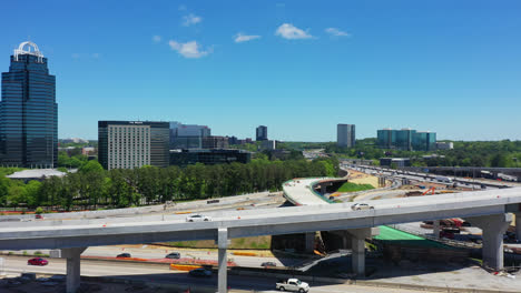 Perimeter-Center-Building-and-traffic-on-highway-at-sunny-day