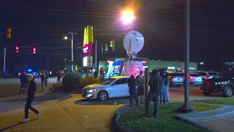 Spectators-Near-The-Area-Where-Mass-Shooting-Suspect-Was-Found-Dead-At-Night-In-Lewiston,-Maine,-USA