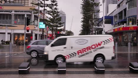 View-across-the-Esplanade-towards-Cavil-Ave-under-heavy-rain,-Surfers-Paradise,-South-East-Queensland