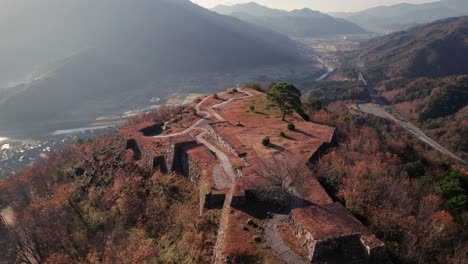 Aerial-Landscape-Japanese-Travel-Destination-Mountain-Range-Ruins,-Takeda-Castle