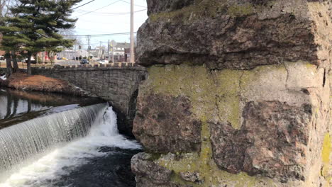 4-K-editorial-footage-of-a-memorial-landmark-bridge-panning-up-in-a-small-town