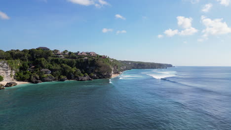 Uluwatu-Cliff-Resorts-Overlook-Bright-Blue-Ocean-In-Bali-Slow-Track-In