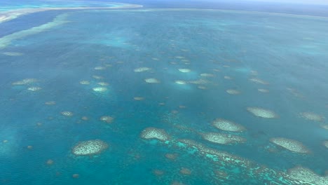 Aerial-4K-of-Great-Barrier-Reef-in-Queensland,-Australia-in-December-2022