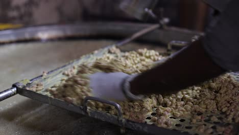 pov-shot-close-up-seen-men-pouring-oil-into-lake-by-hand