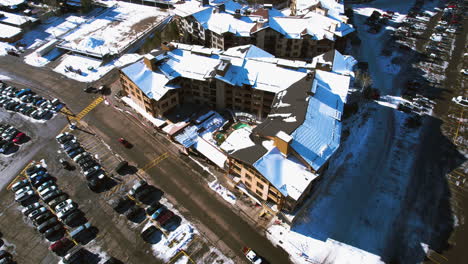 Aerial-View-of-Palisades-Ski-Resort-Buildings,-Lake-Tahoe,-California-USA-on-Sunny-Winter-Day