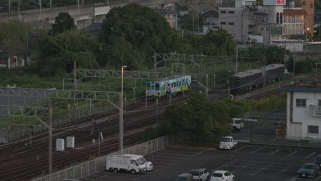 Kumamoto-Electric-Railway-Train-Parked-In-Transportation-Yard,-Japan