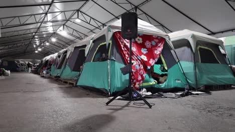 man-and-dauther-migrants-inside-a-inmigrators-shelter-near-the-border-between-mexico-with-unigted-states