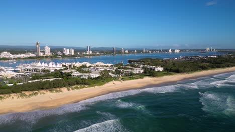 Left-to-right-aerial-views-over-Sheraton-Grand-MIrage-looking-towards-Southport,-Gold-Coast,-Australia