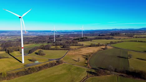 Wind-Turbines-Dominating-the-Rural-Landscape-Under-a-Clear-Blue-Sky