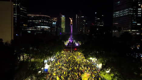 People-waiving-America-Aguilas-Soccer-Team-flags-on-Reforma-avenue-in-CDMX---Aerial-view