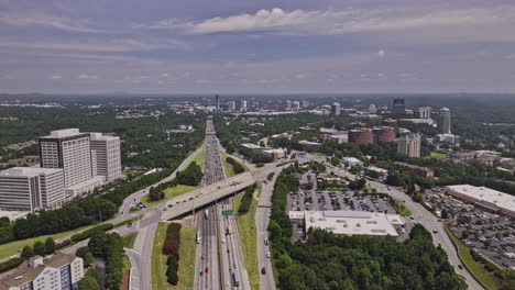 Atlanta-Georgia-Aerial-v991-drone-flyover-above-interstate-freeway-capturing-busy-traffic-motions-and-cityscape-of-Vinings-and-Cumberland-neighborhoods---Shot-with-Mavic-3-Pro-Cine---August-2023