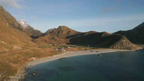 Mountainous-Haukland-Beach-in-Norway-under-clear-blue-sky,-serene-and-scenic-nature-view