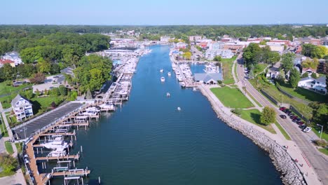 Marina-Full-Of-Sailboats,-Yachts-And-Boats-River-Aerial-flyover