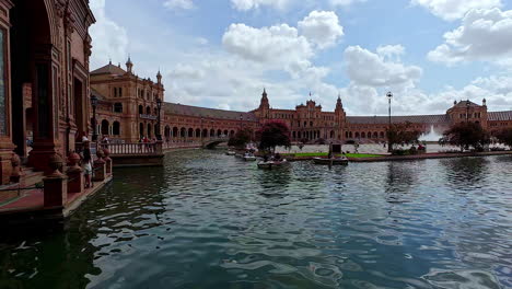 The-beautiful-decorated-Plaza-de-España-with-fluffy-clouds-above