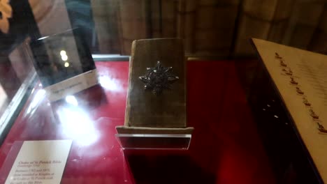 Order-of-Saint-Patrick's-Bible-displayed-in-showcase-in-Dublin-Cathedral,-Ireland