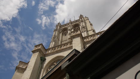 A-Glimpse-of-the-Front-Exterior-of-the-Cathedral-of-Our-Lady-in-Antwerp,-Belgium---Low-Angle-Shot