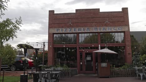 Pizzeria-Bianco-restaurant-outside-located-in-Phoenix,-Arizona-with-video-panning-left-to-right