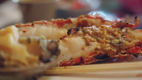 Grilled-Japanese-Abalone-and-Spiny-Ise-Lobsters,-Close-up-of-Seaside-Barbecue