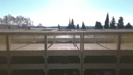 Scenic-aerial-view-of-closed-parking-lot-with-no-cars-in-France