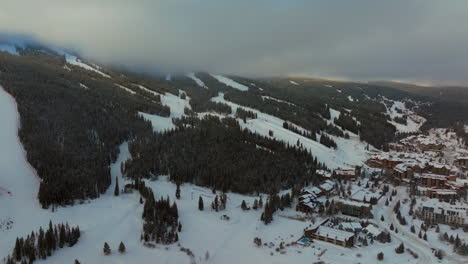 Gray-foggy-cloud-layer-winter-snowy-early-morning-sunrise-aerial-drone-Copper-Mountain-Colorado-ski-resort-i70-Eagle-Flyer-lift-east-village-snowboarding-half-pipe-Ikon-Epic-pass-circle-right