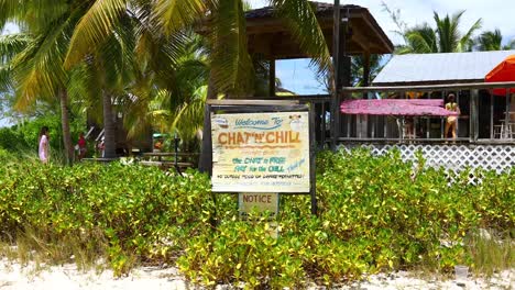 This-is-a-static-video-of-a-sign-for-the-famous-Chat-n-Chill-beach-party-area-in-Exuma